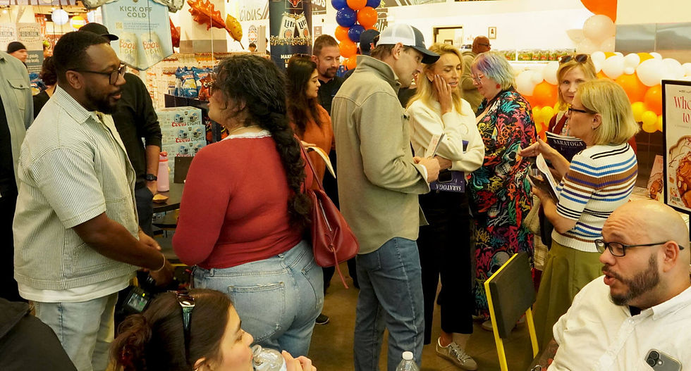 The cookbook launch event drew a crowd. Photo by Bob Benenson