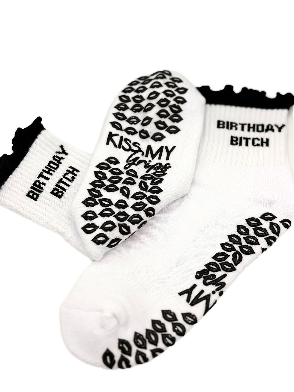Thumbnail: White grip sock laid flat to highlight the sole grip texture and mid-calf length for traction during Pilates workouts.