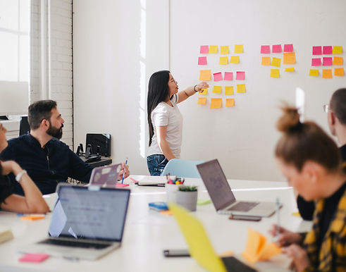 Woman leading office meeting