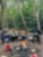 woodland wellbeing wood carving around the campfire