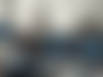 A high-end enterprise team reviewing AI automation dashboards and intelligent workflow tools in a modern digital workspace.