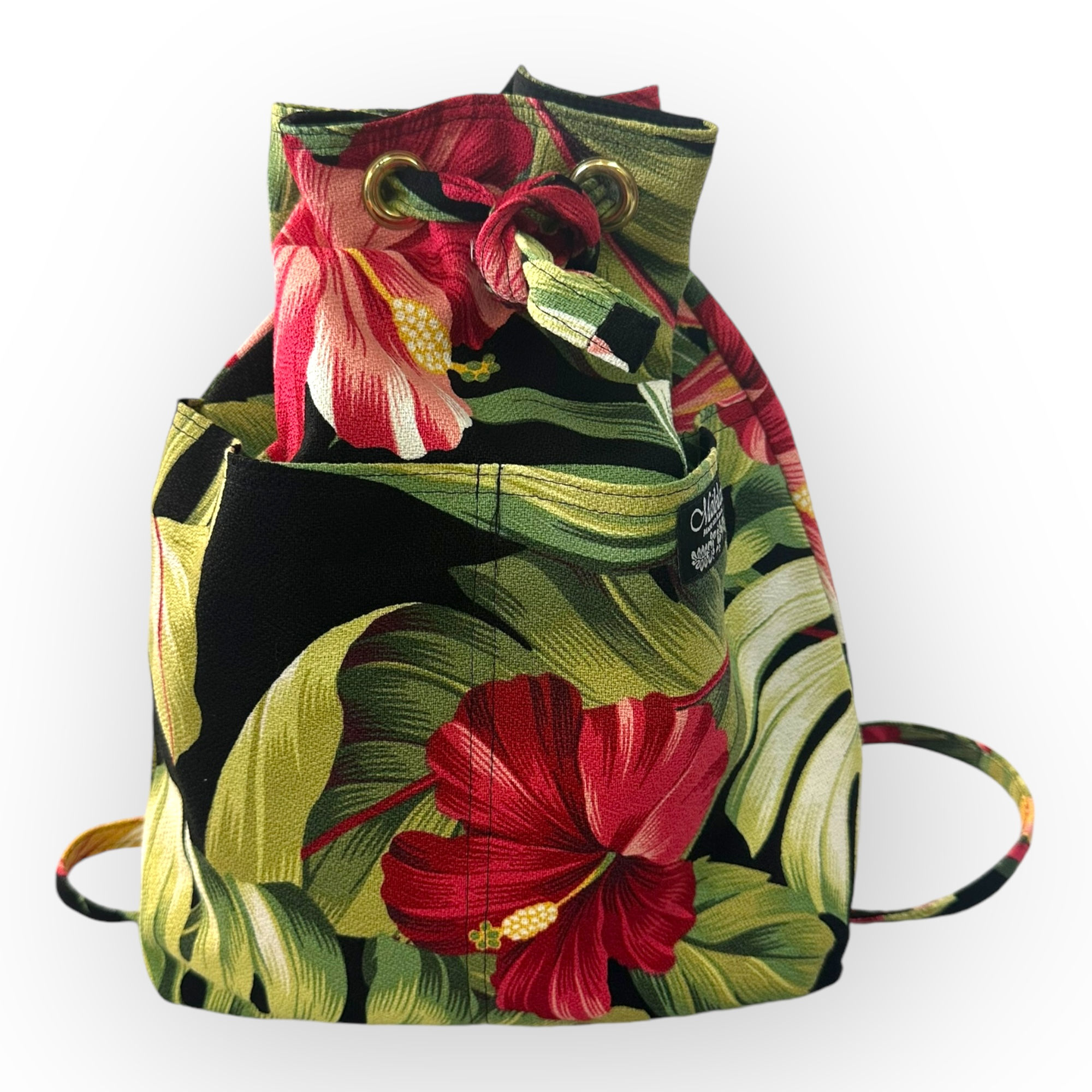 Pua in Black Backpack