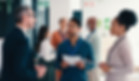 Conference business professionals wearing lanyards