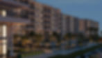 Modern residential building with pool and landscaped gardens at night in Hurghada