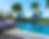 Resort-style swimming pool with palm trees and landscaped garden in Hurghada sea view development