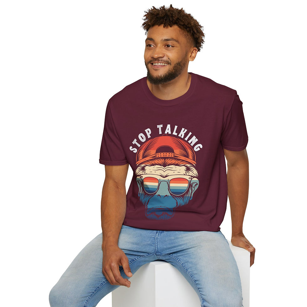 Thumbnail: a gildan softstyle t-shirt with a monkey and text on the front that reads "stop talking"