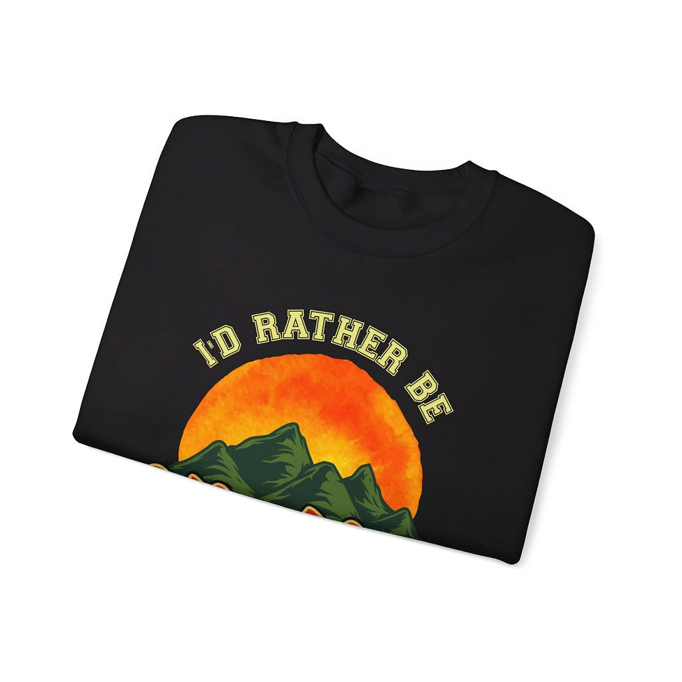 Thumbnail: a pullover sweatshirt inspired by camping with text that reads "Climbing Mountains"