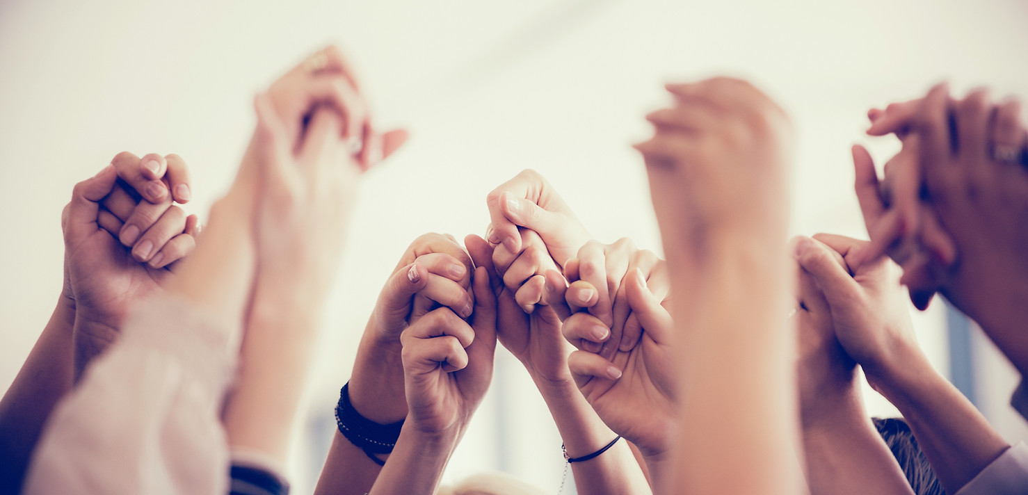 Women Holding Hands