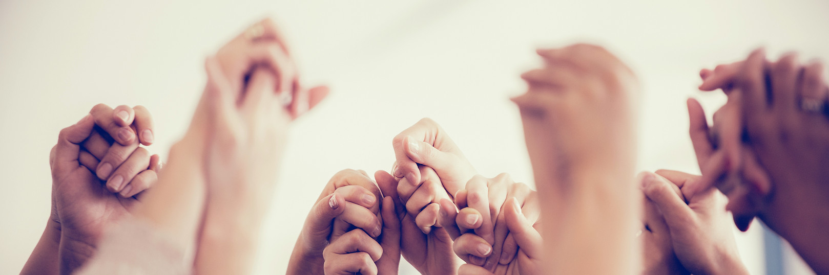 women-holding-hands