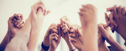 Women Holding Hands