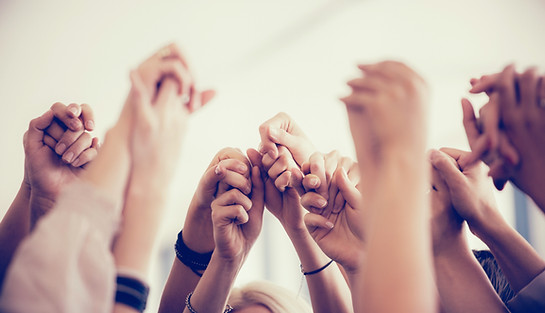 Women Holding Hands