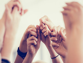 Women Holding Hands