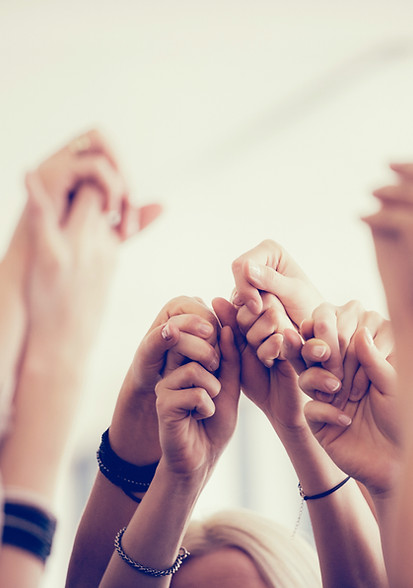 Women Holding Hands