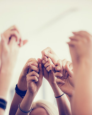 Women Holding Hands