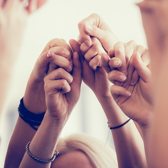 Women Holding Hands