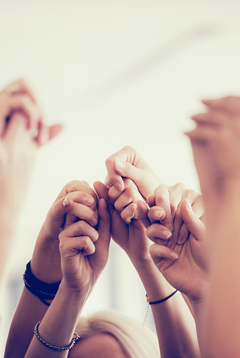 Women Holding Hands