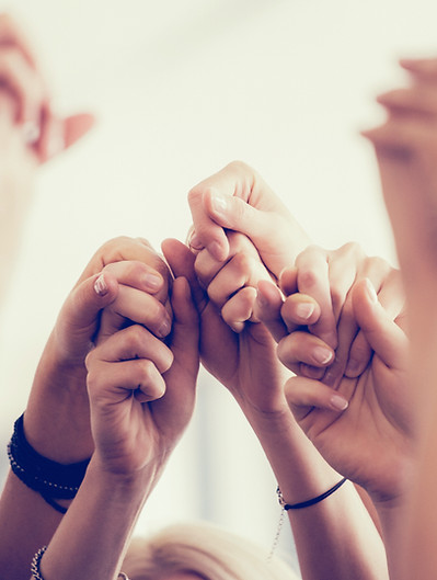 Women Holding Hands