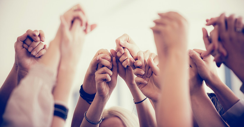 Women Holding Hands