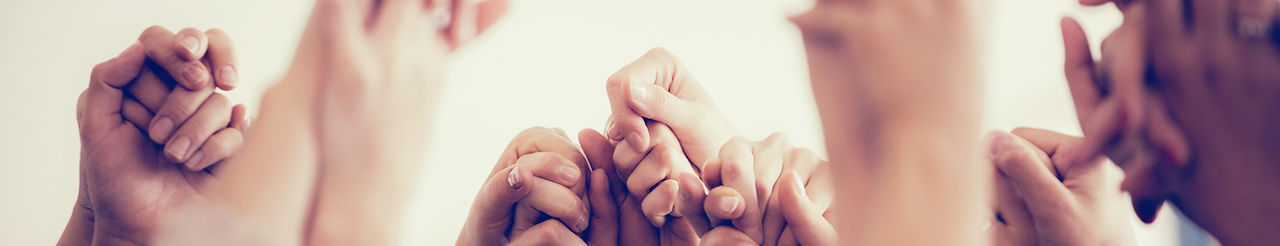 Women Holding Hands