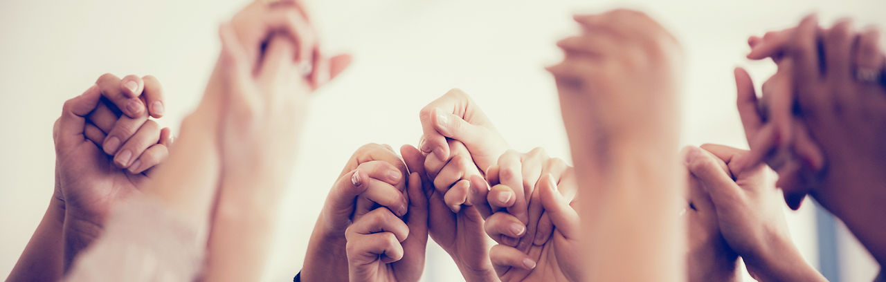 Women Holding Hands