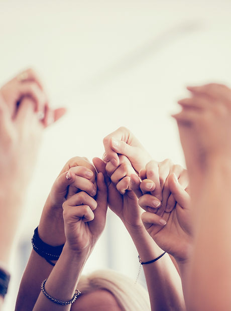 Women Holding Hands