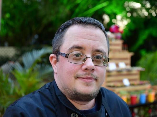 Transgender chef Chris Trapani outside in India