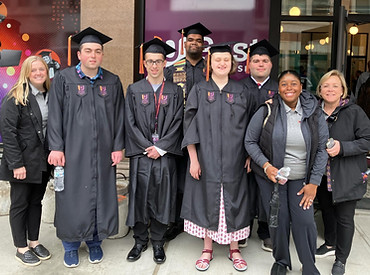 Group of students post for photo at University Pathways Program Graduation