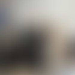 Debra Ravlin, Brooker Memorial's dental hygienist, explains the equipment she uses to a group of guests at the new dental clinic on Grove Street.