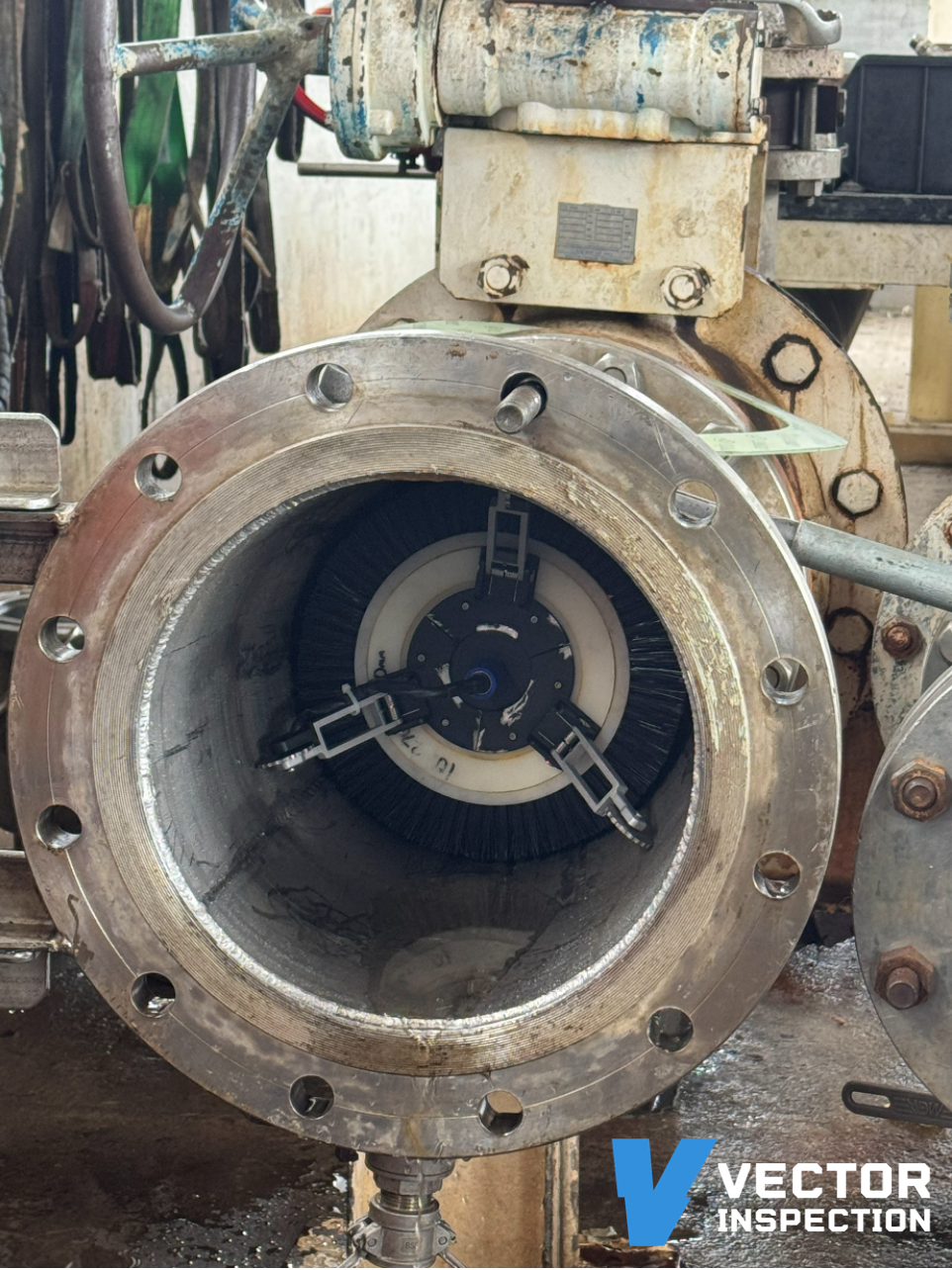 Vector Inspection Phased Array UT tool inspecting a 10-inch pipeline with mixed carbon steel and stainless steel materials, navigating tight 1.5D bends for combined crack detection and wall loss analysis.