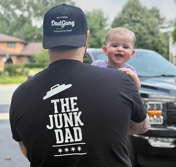 The Junk Dad founder RJ Krempasky with his daughter and work outfit