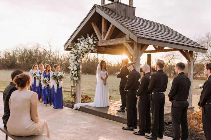 Sunset ceremony at Ohio barn wedding venue