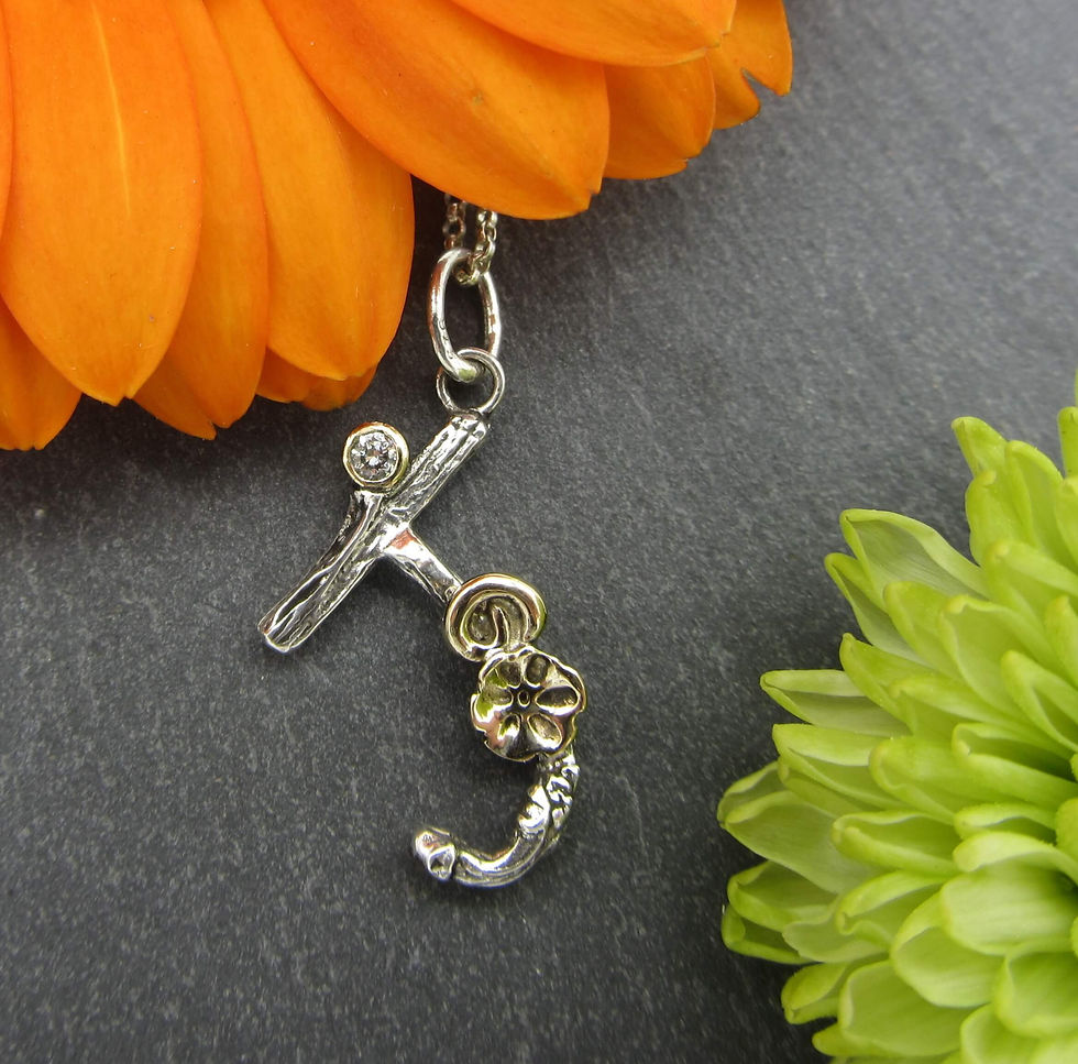 Thumbnail: Letter J Necklace with diamond and gold detail