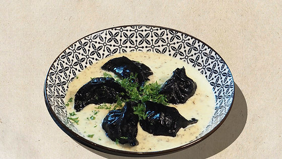Pork dumplings in truffle cream