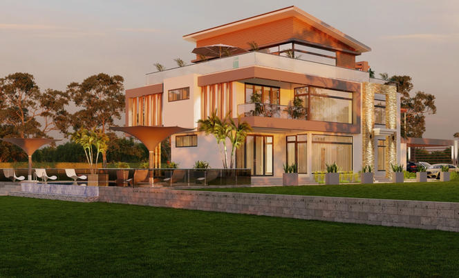 Modern luxury home with large windows and a manicured lawn at sunset.