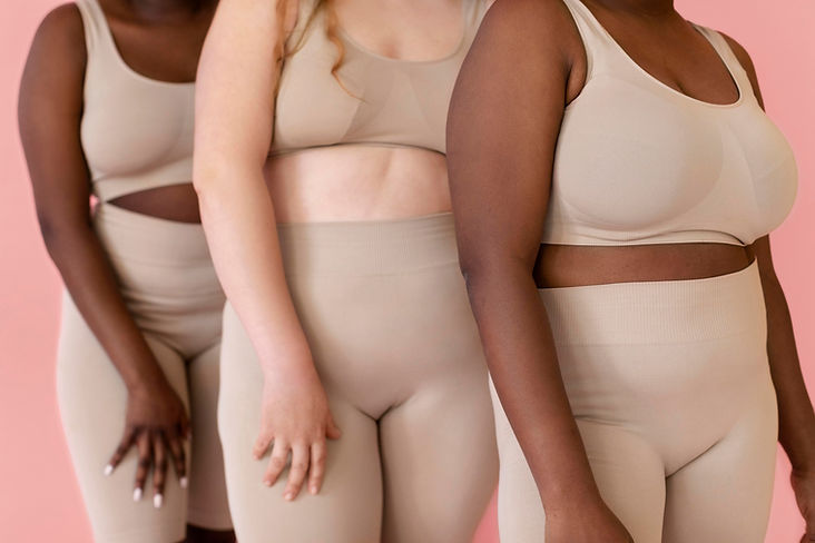 three-women-posing-while-wearing-body-shaper.jpg