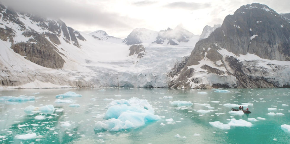 A breathtaking view of glaciers and icebergs at Svalbard Archipelago Hope Spot in Norway, showcasing the serene beauty and icy wilderness of the Arctic landscape.