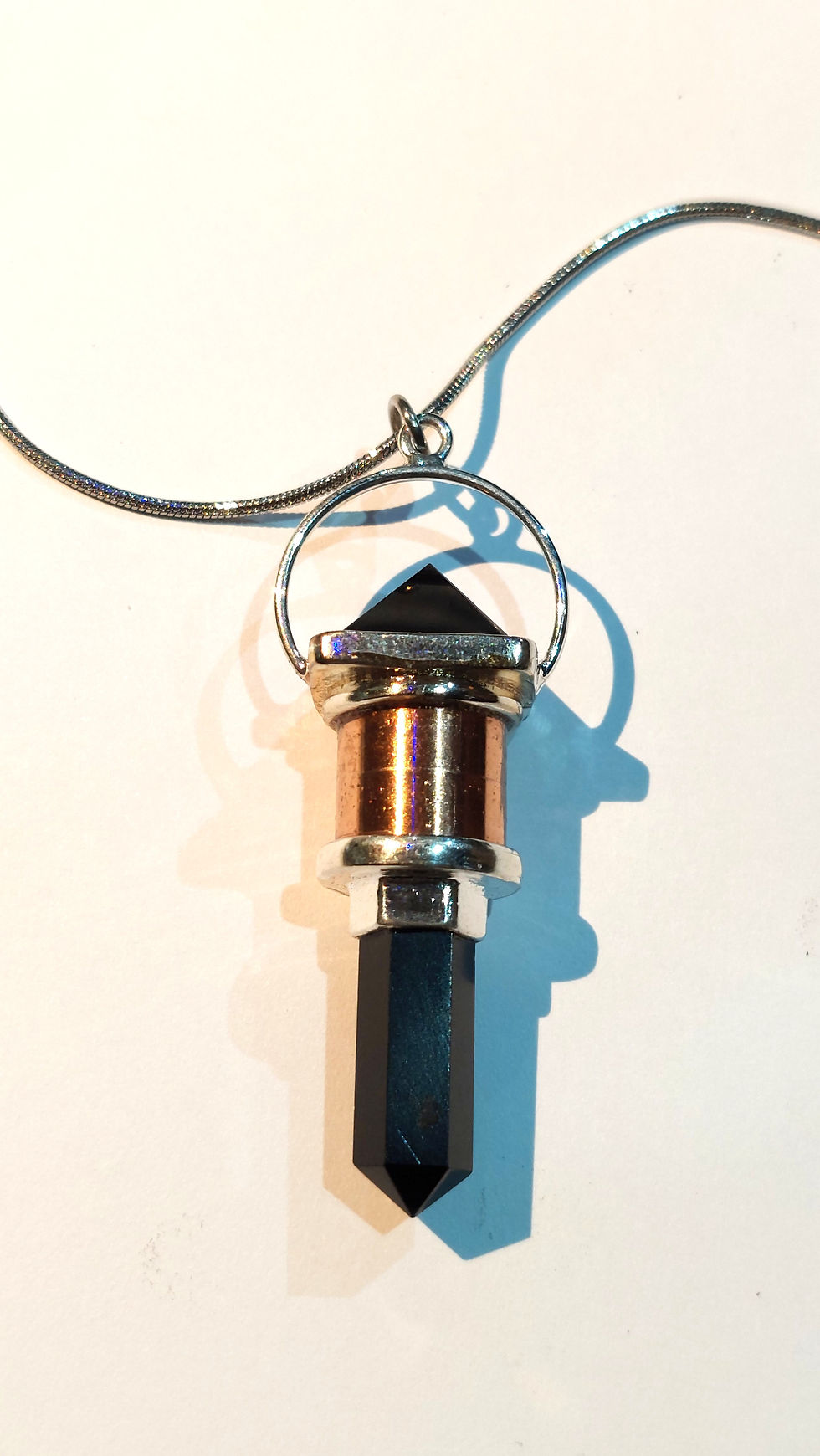 A Black Obsidian Copper Pendant
