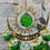 Thumbnail: A green coloured sun catcher