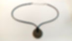 Black cord necklace with bronze Chinese coin pendant