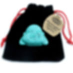Turquoise Crystal Buddha head on a velvet bag
