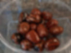 Red and black tumbled stones