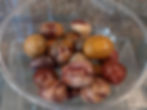 Polished tumbled stones in bowl