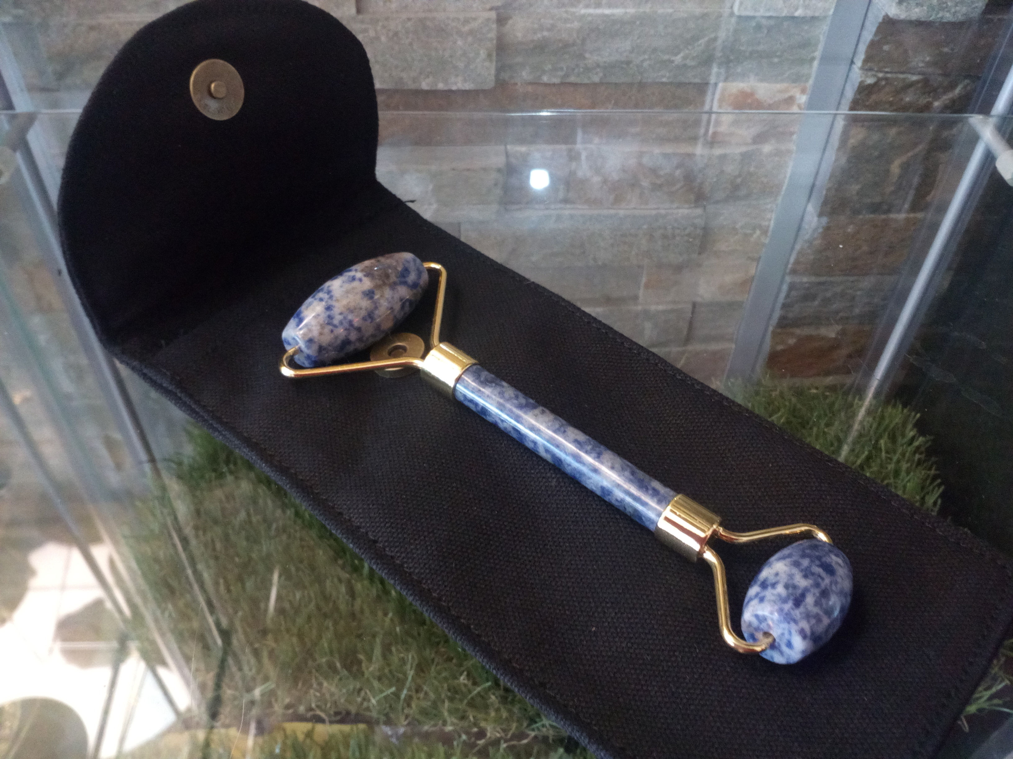 Blue sodalite facial roller in velvet case