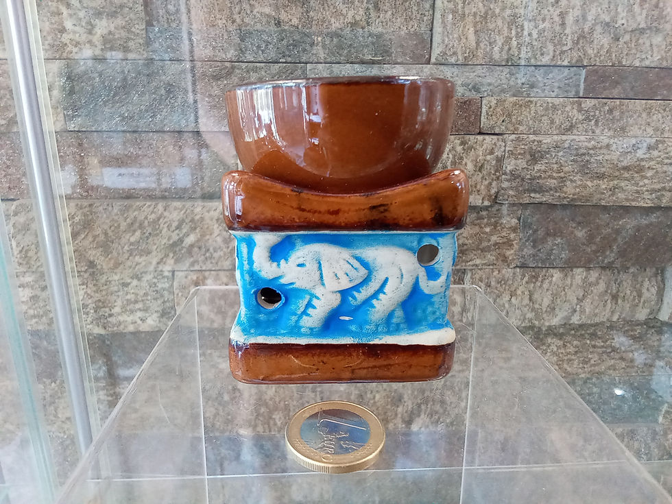 Thumbnail: Brown ceramic elephant oil burner