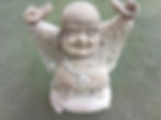 Hand-carved Buddha statue, arms raised, 40cm tall