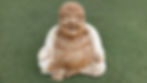 Smiling Buddha statue, wood carving