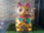 Golden Maneki-neko figurine