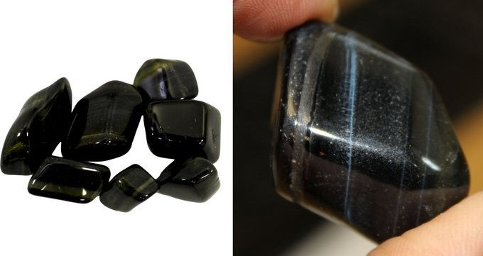 Black tumbled stones, close-up view