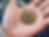 Thumbnail: Hand holding ancient Chinese coin