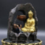 Golden Buddha water fountain statue